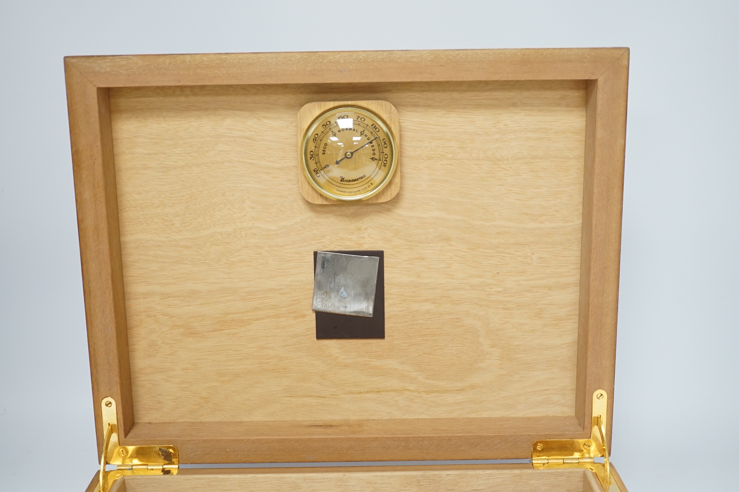 A modern wooden humidor with inset humidity measure, 29cm x 23cm x 9.5cm